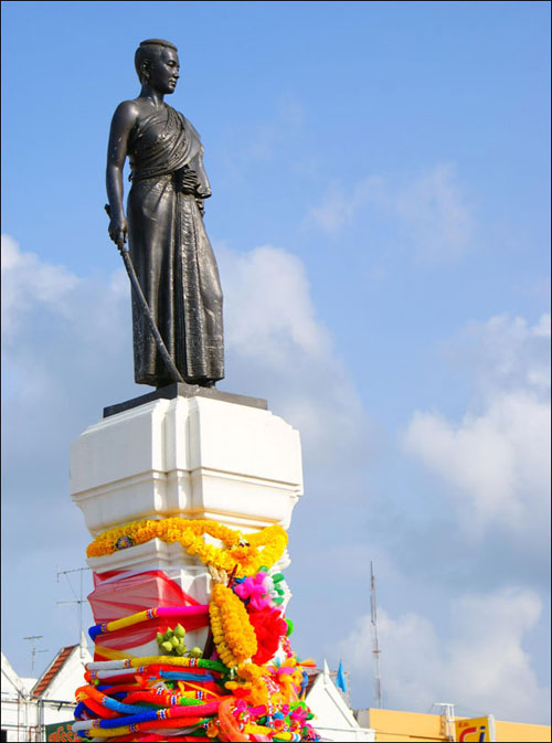 The Morning Alms Round at the court around Thao Suranari Monument