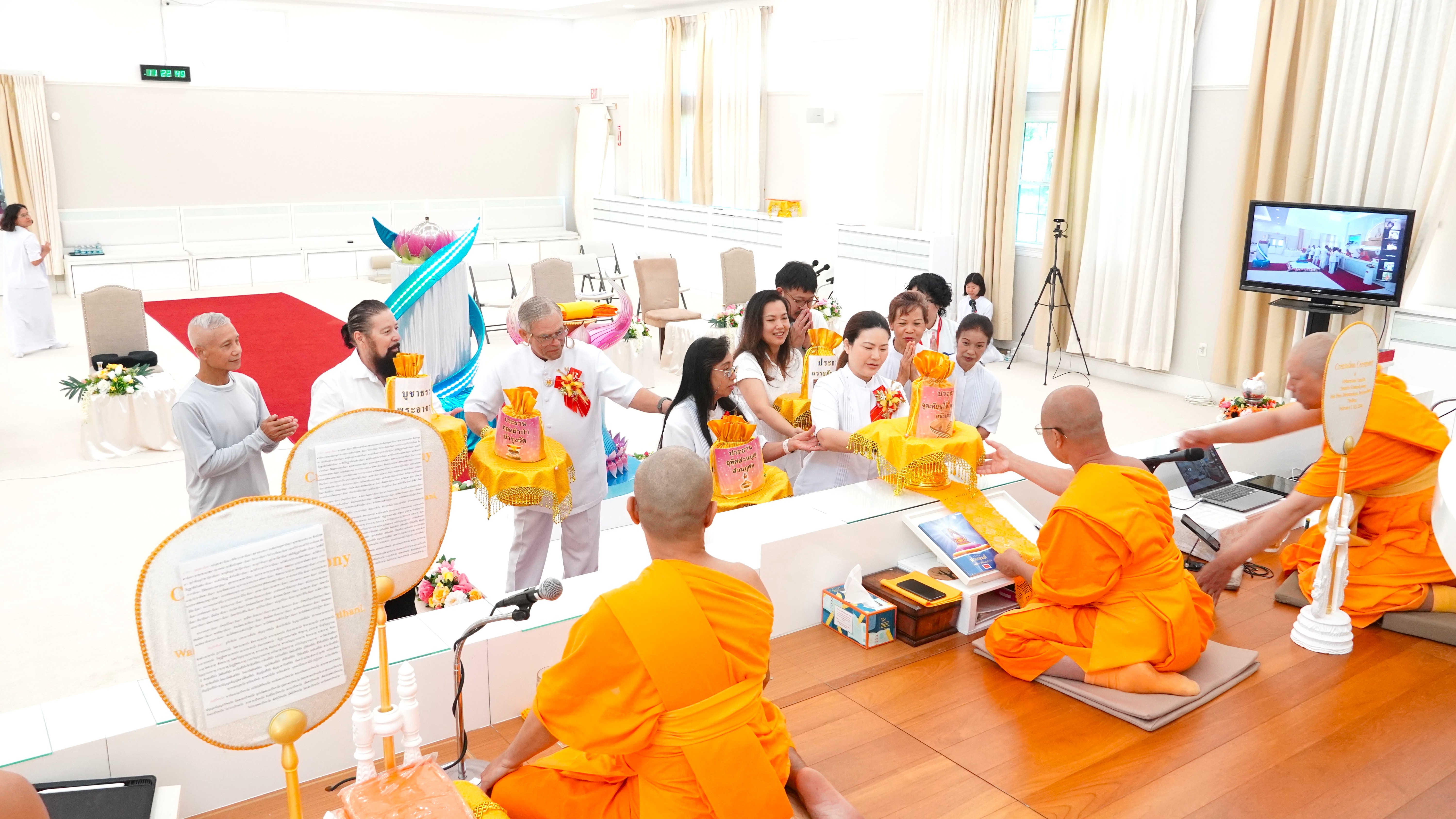 วัดพระธรรมกายฟลอริดา จัดพิธีจุดเทียนใจไฟนิรันดร์อนันตชัย