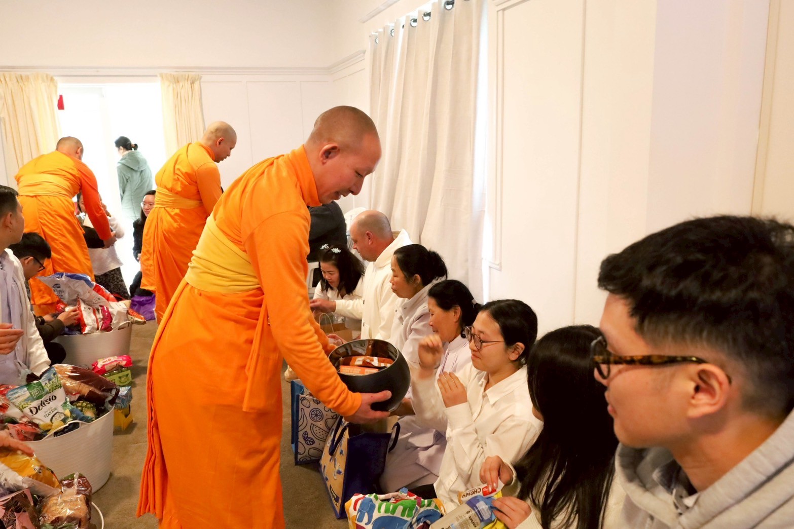 วัดพระธรรมกายดันนีดิน จัดงานวันครูผู้ค้นพบวิชชาธรรมกาย และบูชาข้าวพระ
