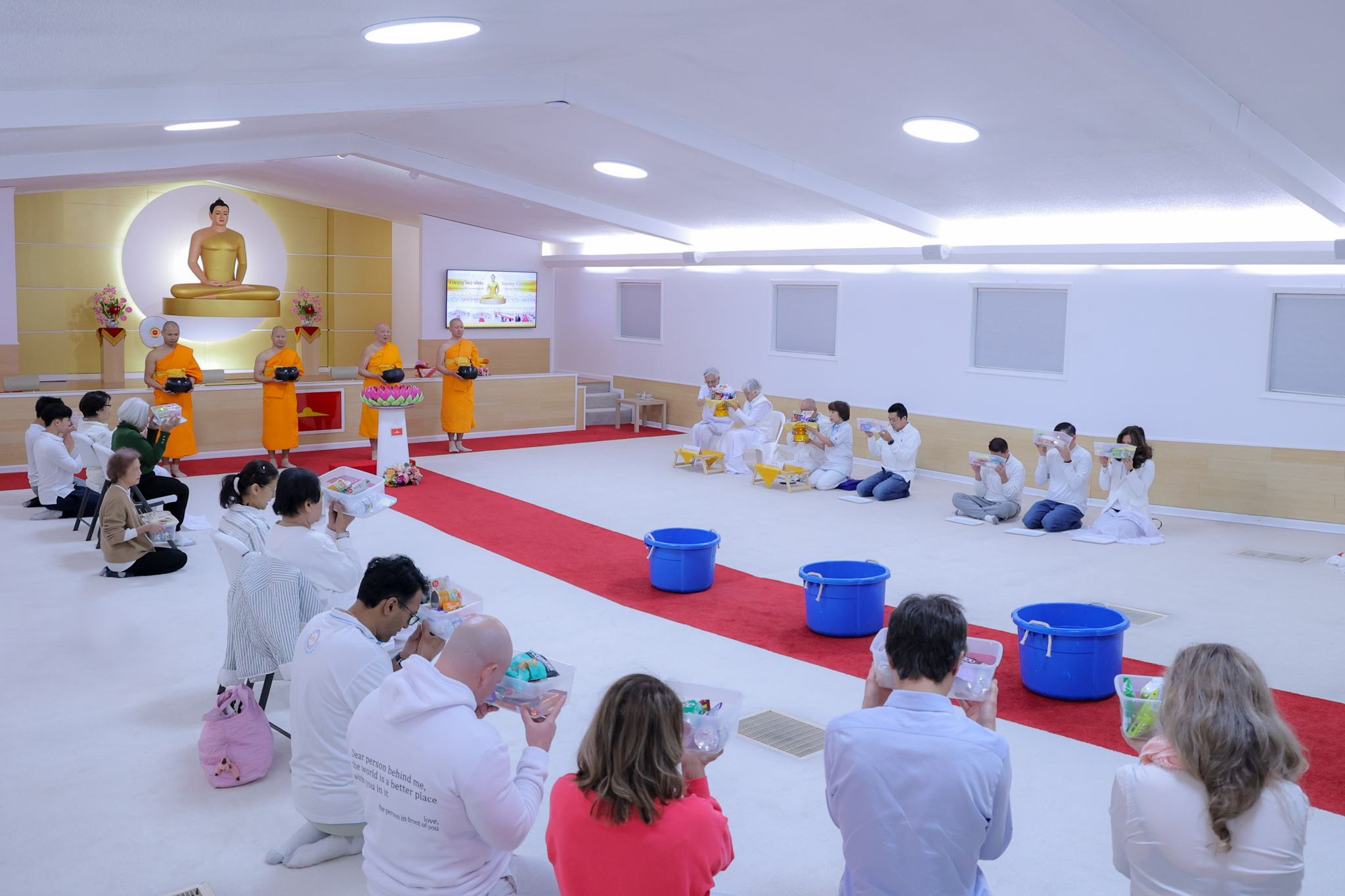 วัดพระธรรมกายจอร์เจีย จัดงานบุญวันอาทิตย์ และพิธีทอดผ้าป่าบำรุงวัด