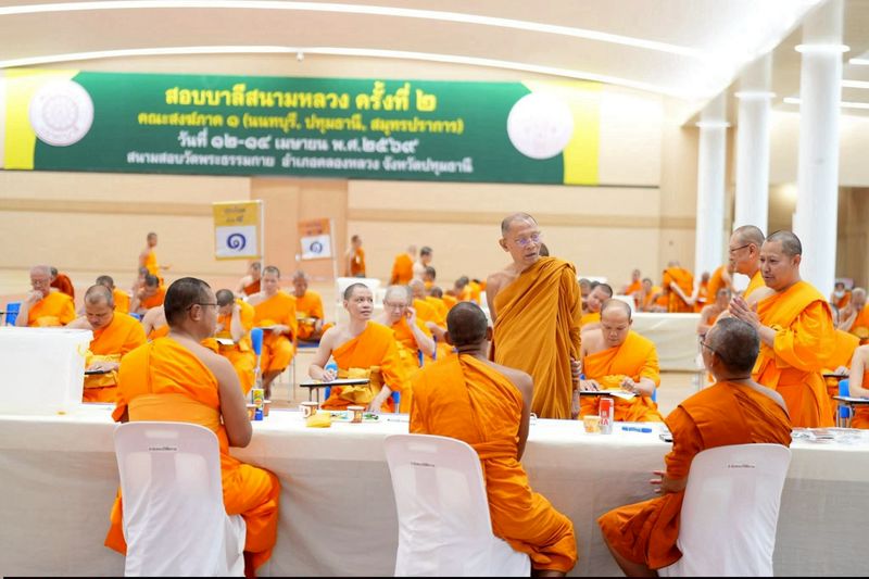 The abbot of Wat Sam Phraya visits a venue of the 2nd Pali test at Wat Phra Dhammakaya