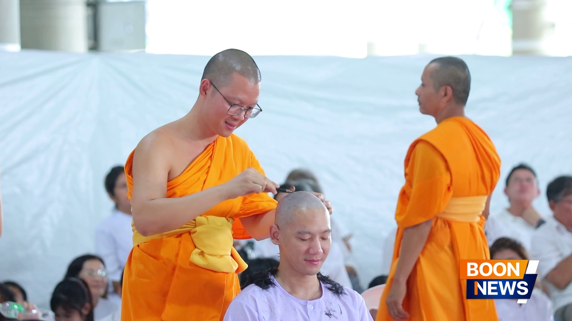 พิธีตัดปอยผมโครงการอุปสมบทหมู่ธรรมทายาท ระดับอุดมศึกษา รุ่นที่ 53 ภาคฤดูฝน