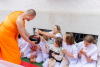 พิธีตักบาตรข้าวสารอาหารแห้งแด่พระสงฆ์ จำนวน 4 รูป 