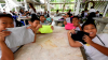 ฐานที่ 2 : ฐานจัดพับเก็บตามแบบคุณยายอาจารย์มหารัตนอุบาสิกาจันทร์ ขนนกยูง 