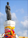 The Morning Alms Round at the court around Thao Suranari Monument