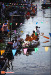 The photo collection of the Morning Alms Round at Thakha Floating Market
