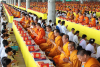 Monks, novices and lay Buddhists from all over Thailand and overseas join forces to create “global-cooling effects” on the Earth Day 22 April 2015