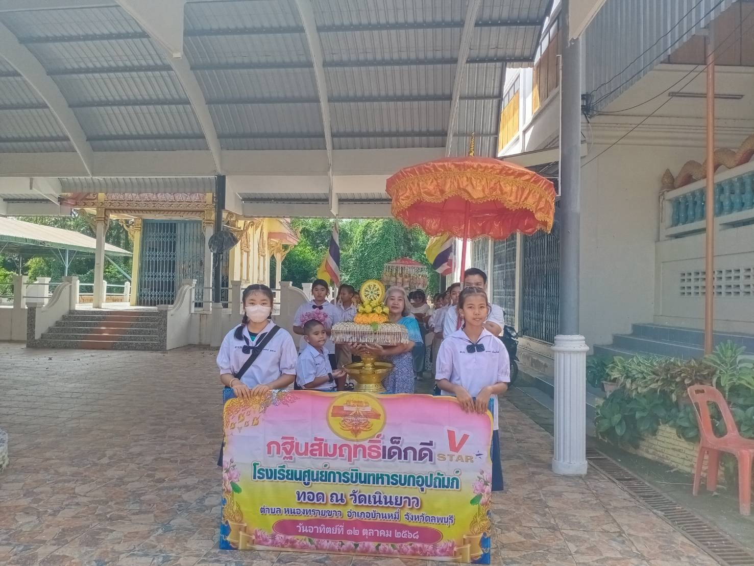ภาพร่วมพิธีกรรมวัดเนินยาว