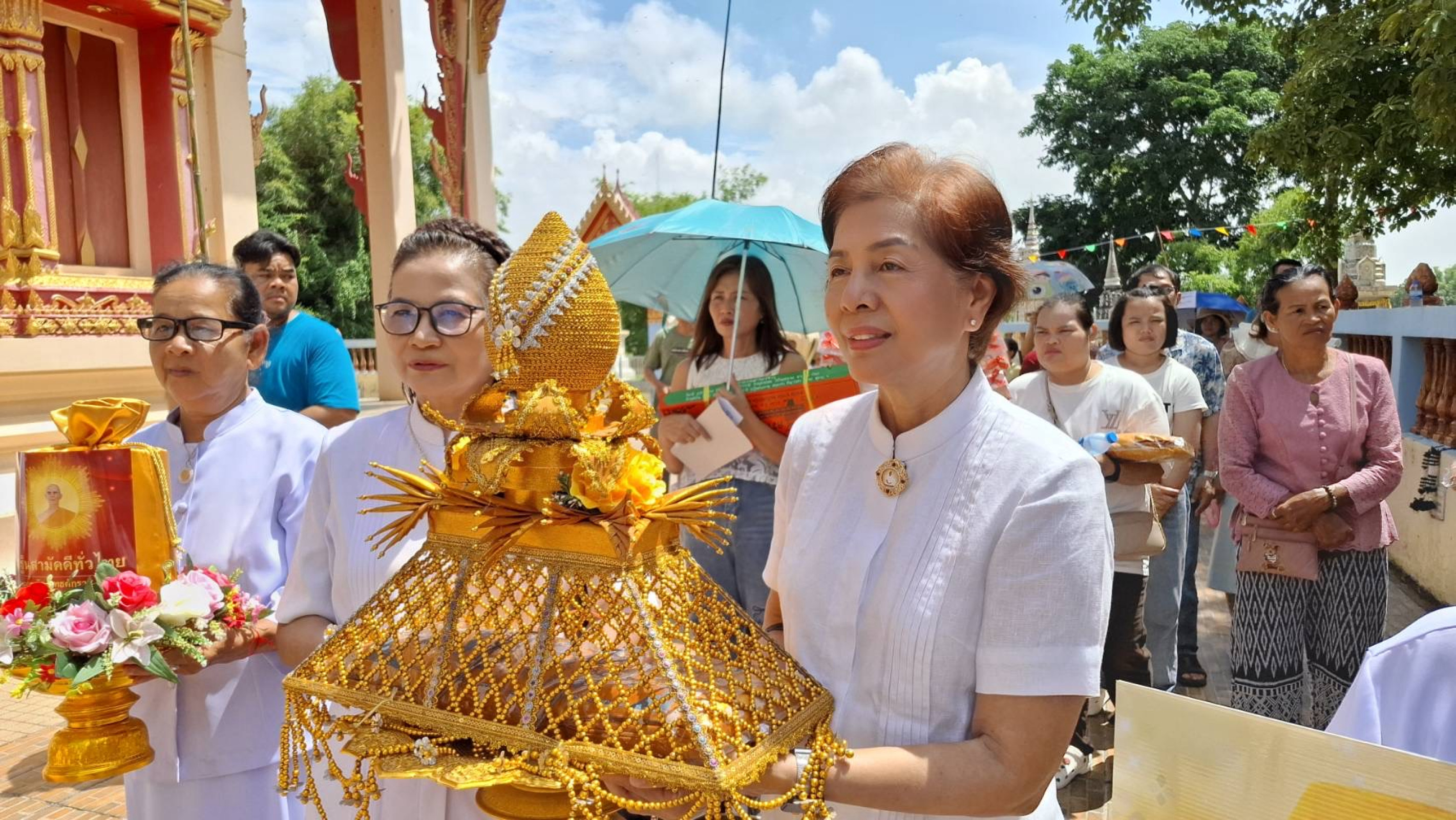 ภาพร่วมพิธีกรรมวัดโพนทอง