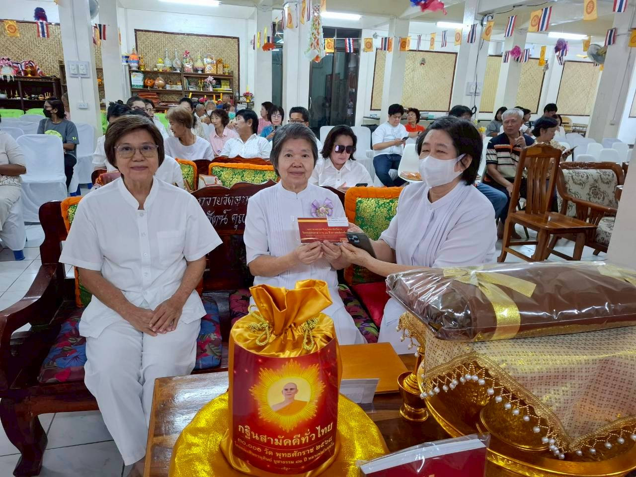 ภาพร่วมพิธีกรรมวัดอุตมพิชัย