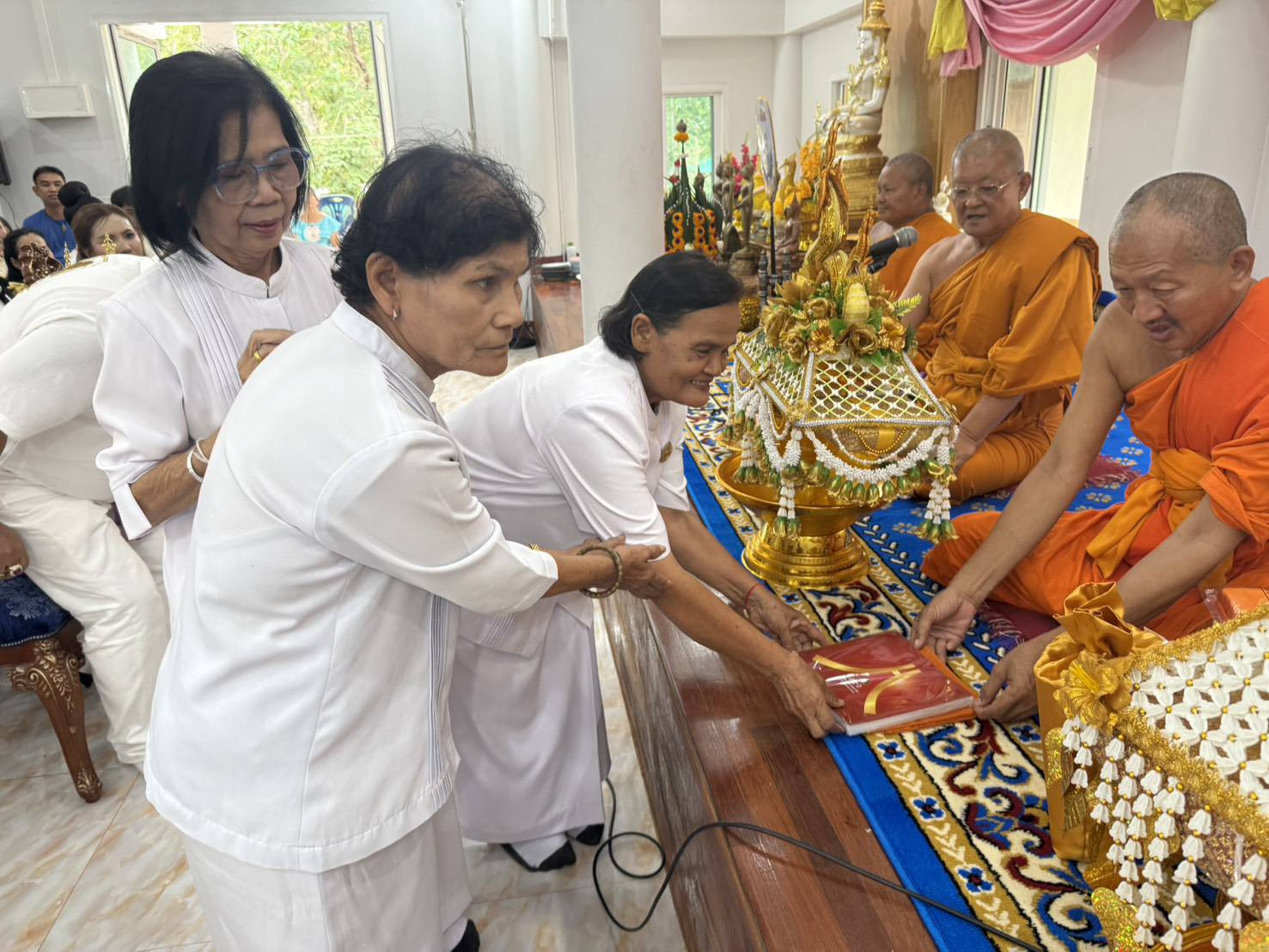 ภาพร่วมพิธีกรรมสำนักสงฆ์พุทธอุทยานบ้านพุตูม