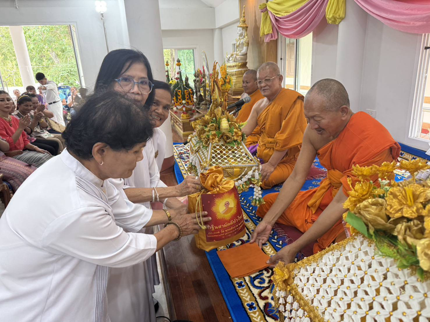ภาพร่วมพิธีกรรมสำนักสงฆ์พุทธอุทยานบ้านพุตูม
