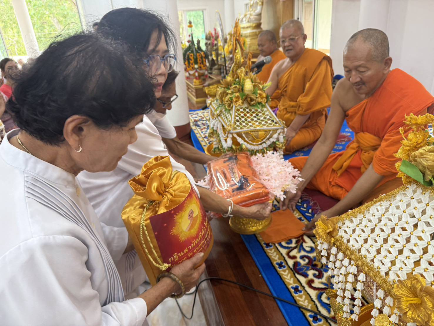 ภาพร่วมพิธีกรรมสำนักสงฆ์พุทธอุทยานบ้านพุตูม