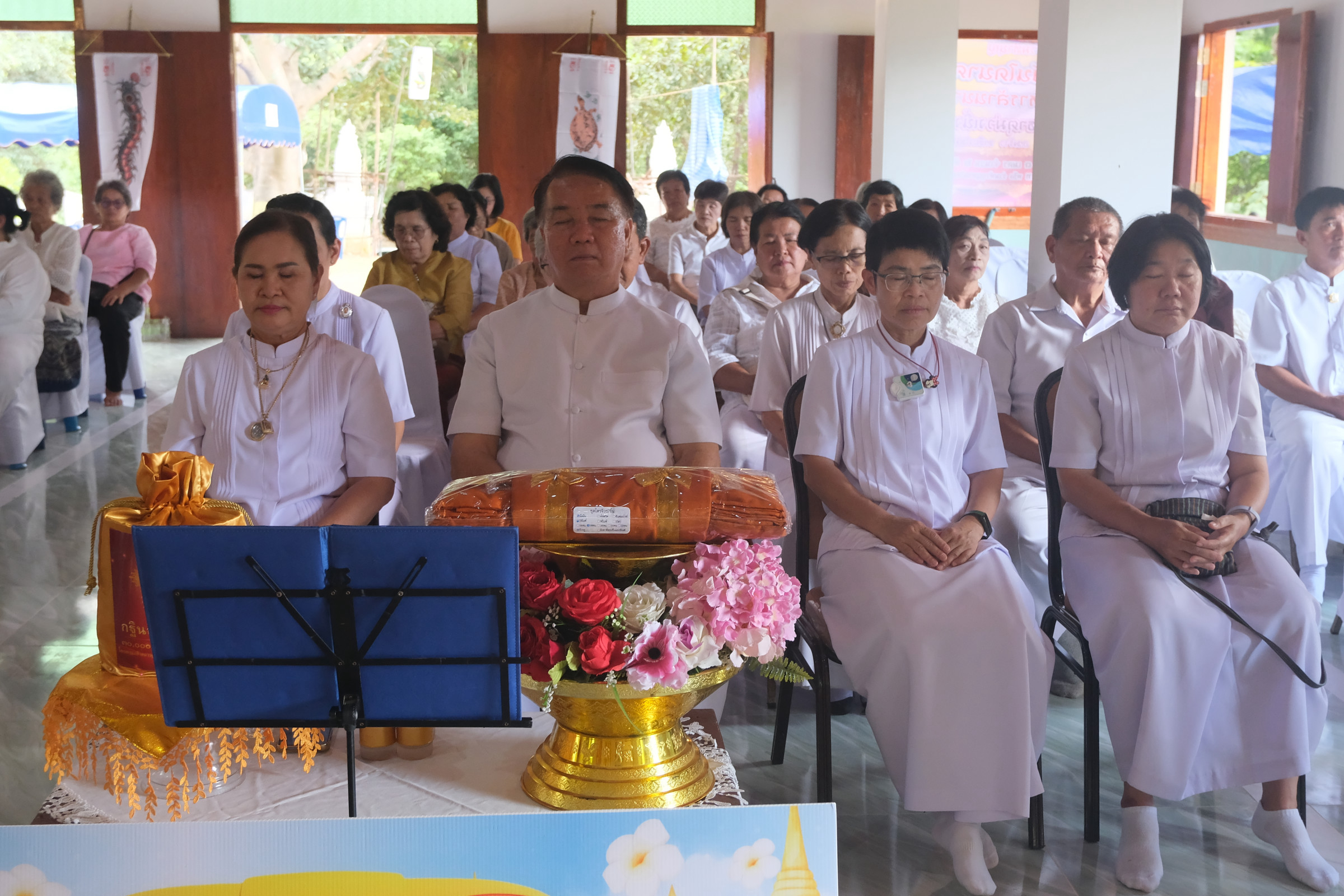 ภาพร่วมพิธีกรรมวัดพระธาตุม่วงเนิ้ง