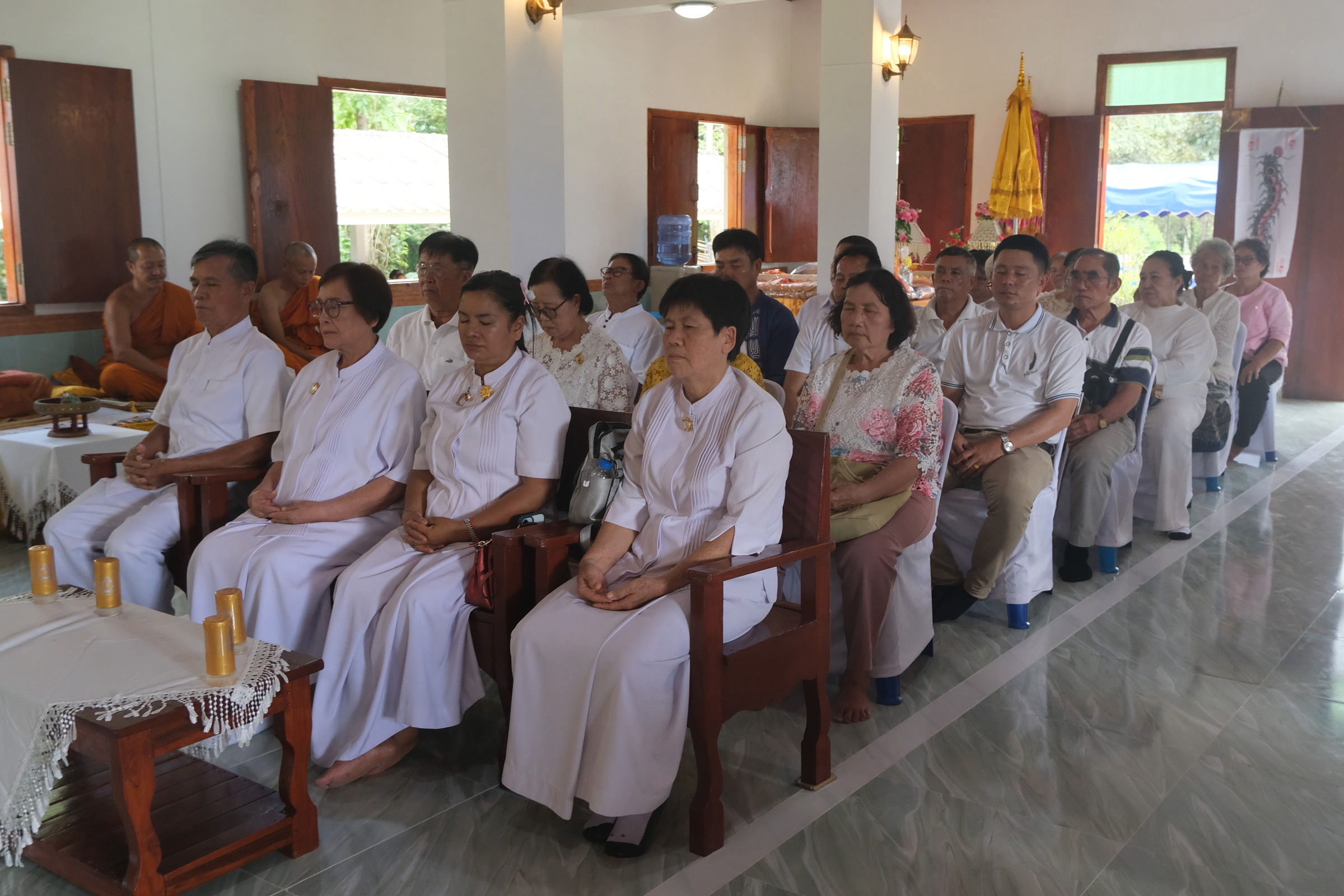 ภาพร่วมพิธีกรรมวัดพระธาตุม่วงเนิ้ง