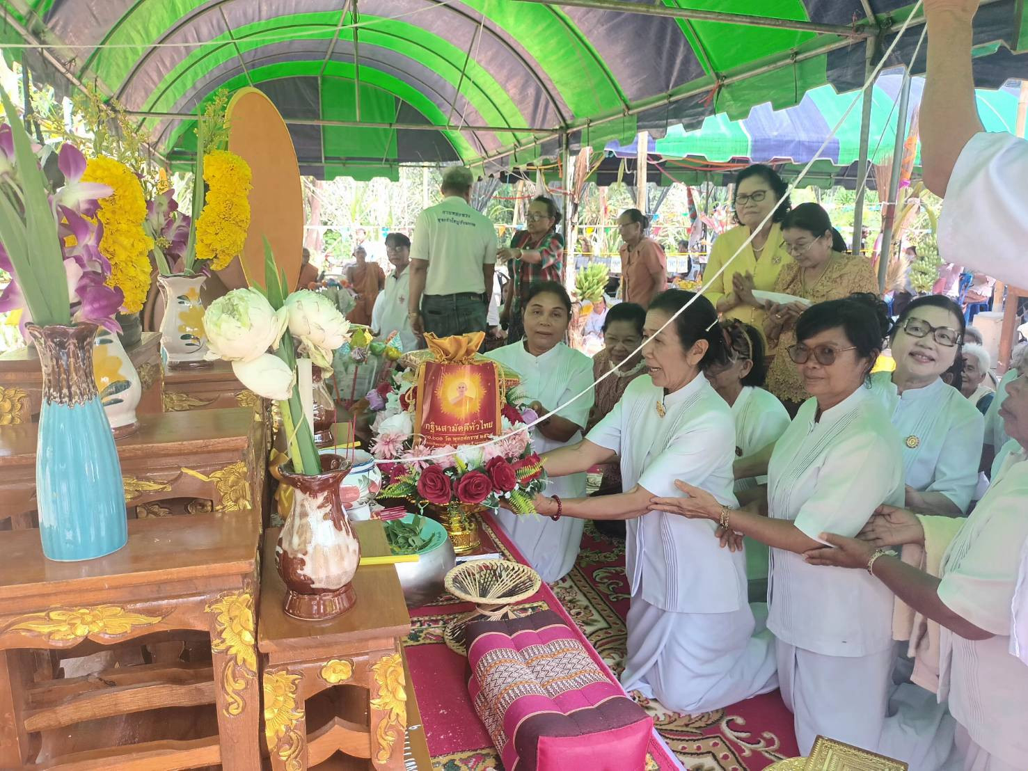 ภาพการถวายปัจจัยวัดพายัพซับใหญ่