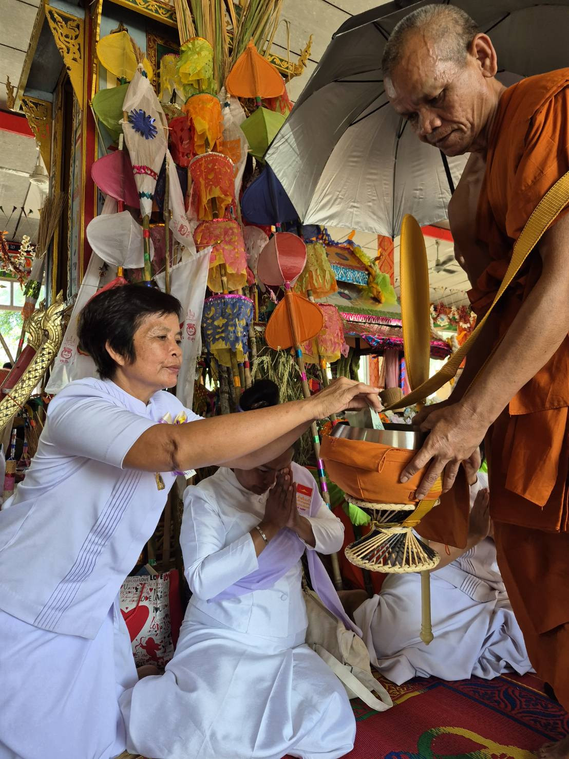 ภาพร่วมพิธีกรรมวัดอำภา