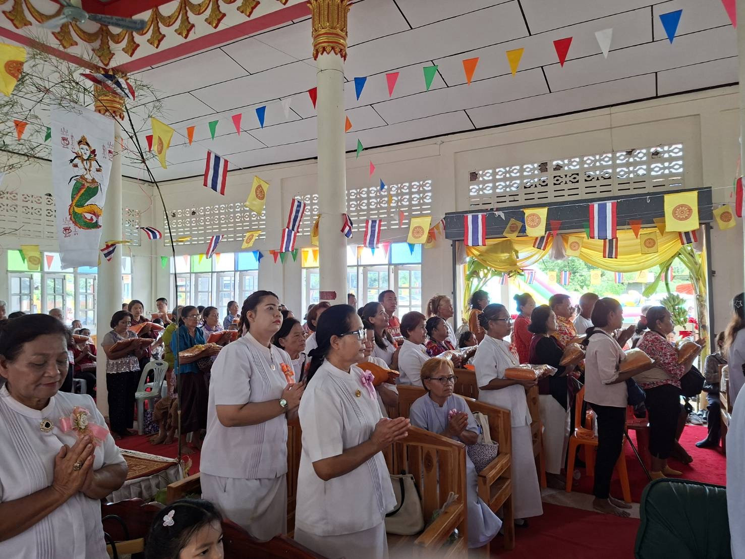 ภาพร่วมพิธีกรรมวัดโนนลาว