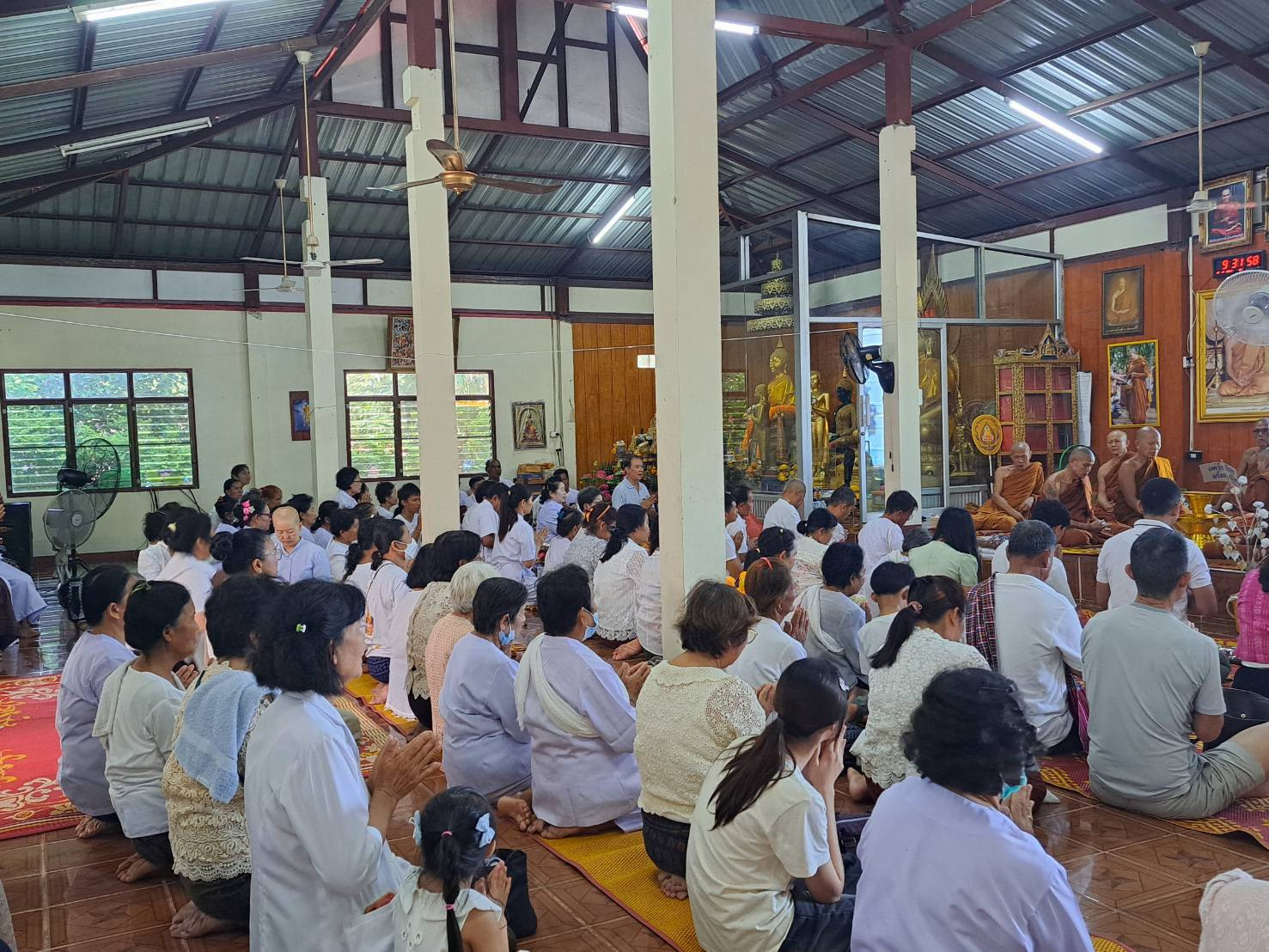 ภาพร่วมพิธีกรรมวัดป่าโอภาโส