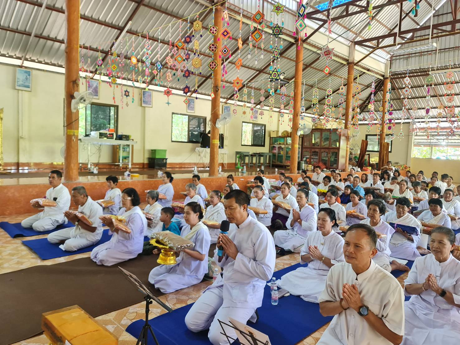 ภาพร่วมพิธีกรรมวัดสิมมาเจริญสุข