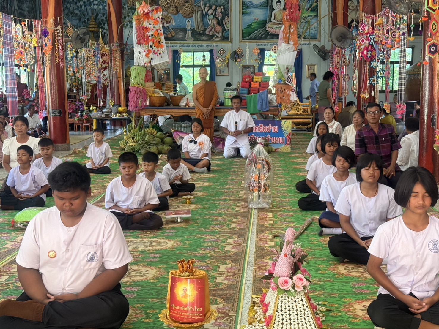 ภาพร่วมพิธีกรรมวัดคำมูล