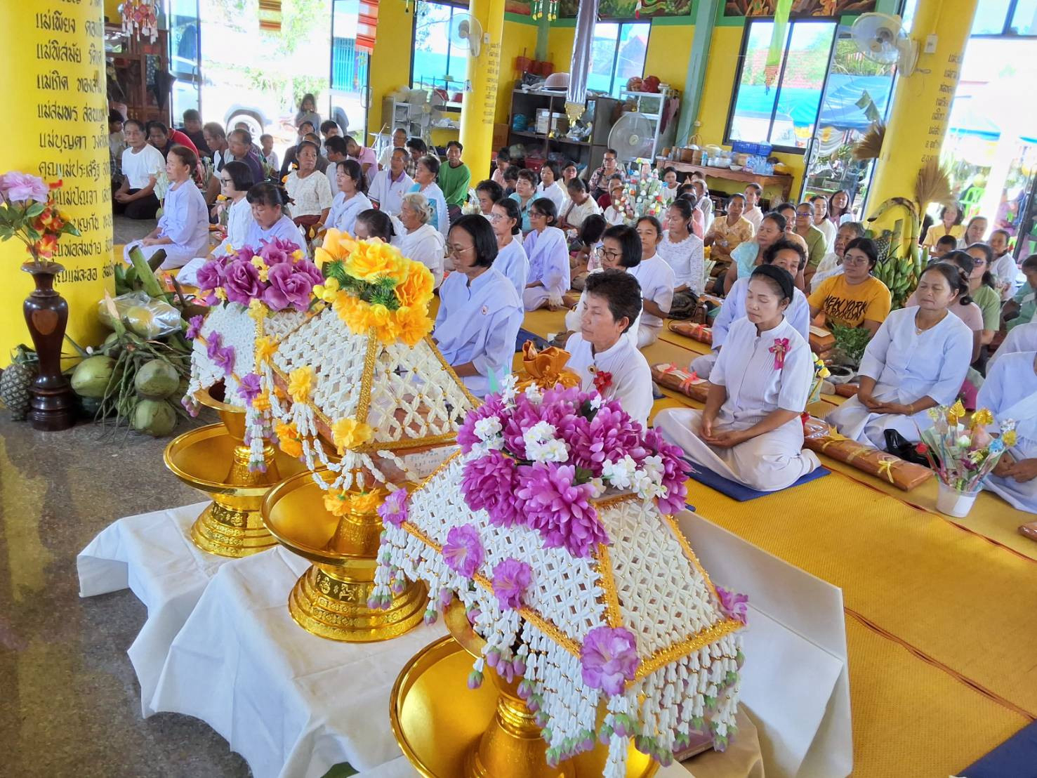 ภาพร่วมพิธีกรรมวัดโพนสิมมา