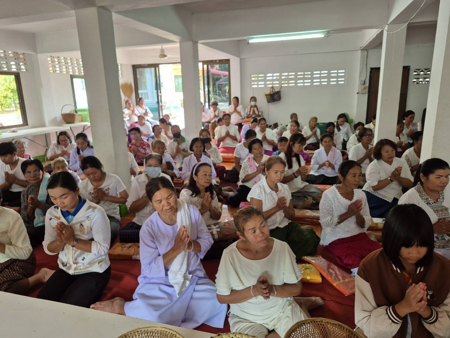 ภาพร่วมพิธีกรรมวัดโพนแพง