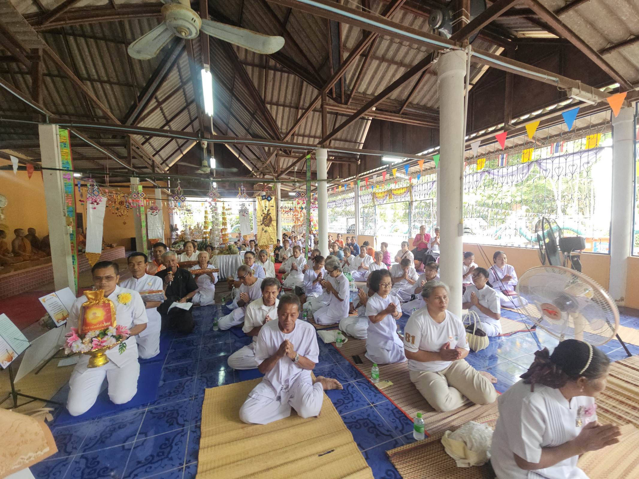 ภาพร่วมพิธีกรรมวัดโนนคำวิเวก