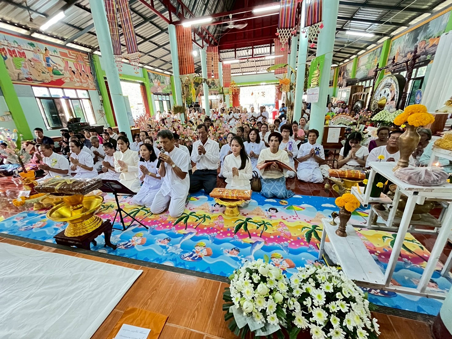 ภาพร่วมพิธีกรรมวัดโพธื์คำ