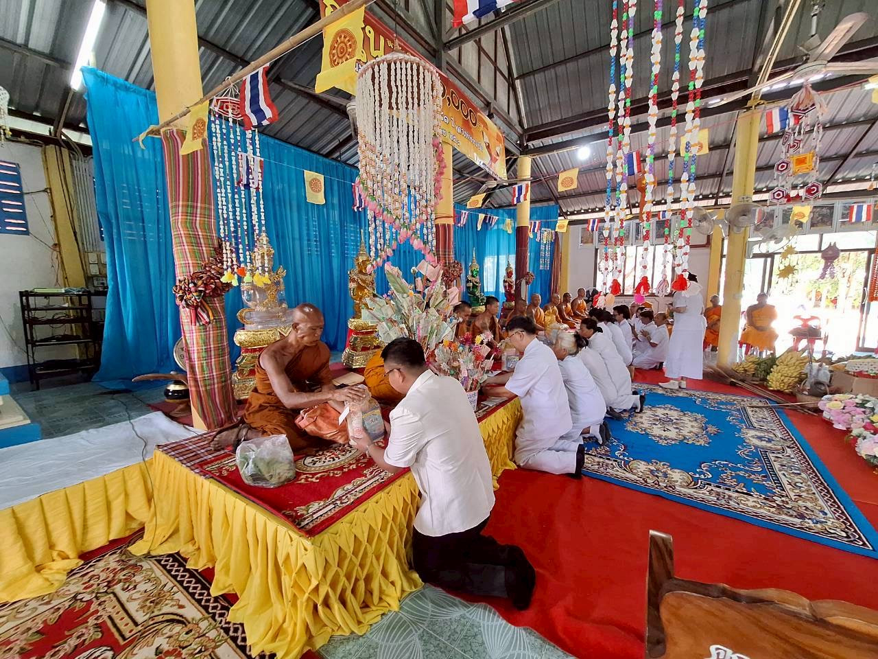 ภาพร่วมพิธีกรรมวัดบ้านปะคำสำโรง