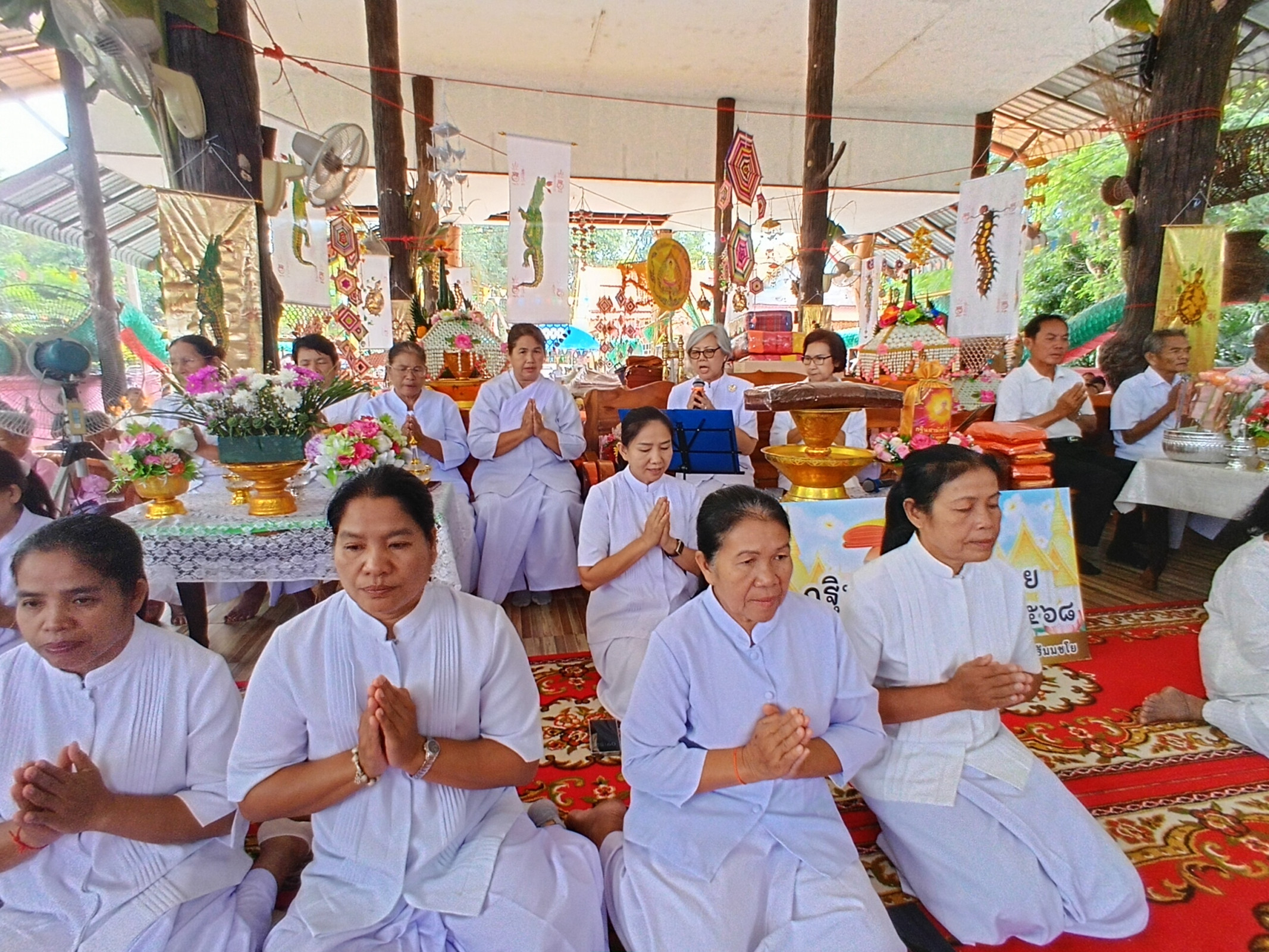 ภาพร่วมพิธีกรรมวัดป่าโนนยางแสงคำ