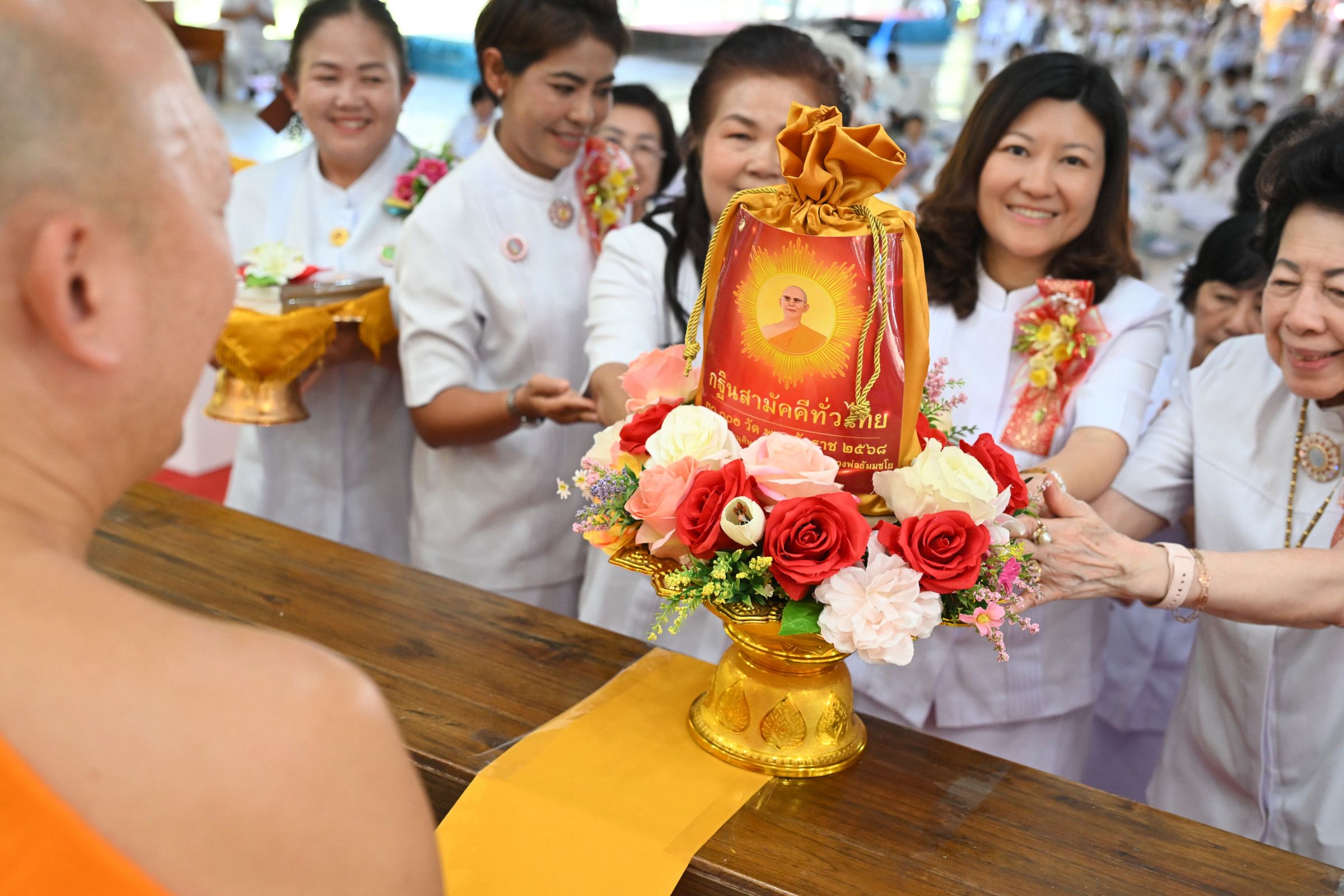 ภาพการถวายปัจจัยศูนย์อบรมเยาวชนอุตรดิตถ์ (แก้วพฤกษา)