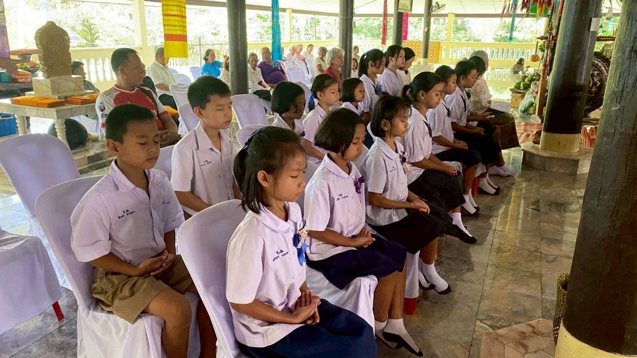 ภาพร่วมพิธีกรรมวัดโต๊ะโมะ