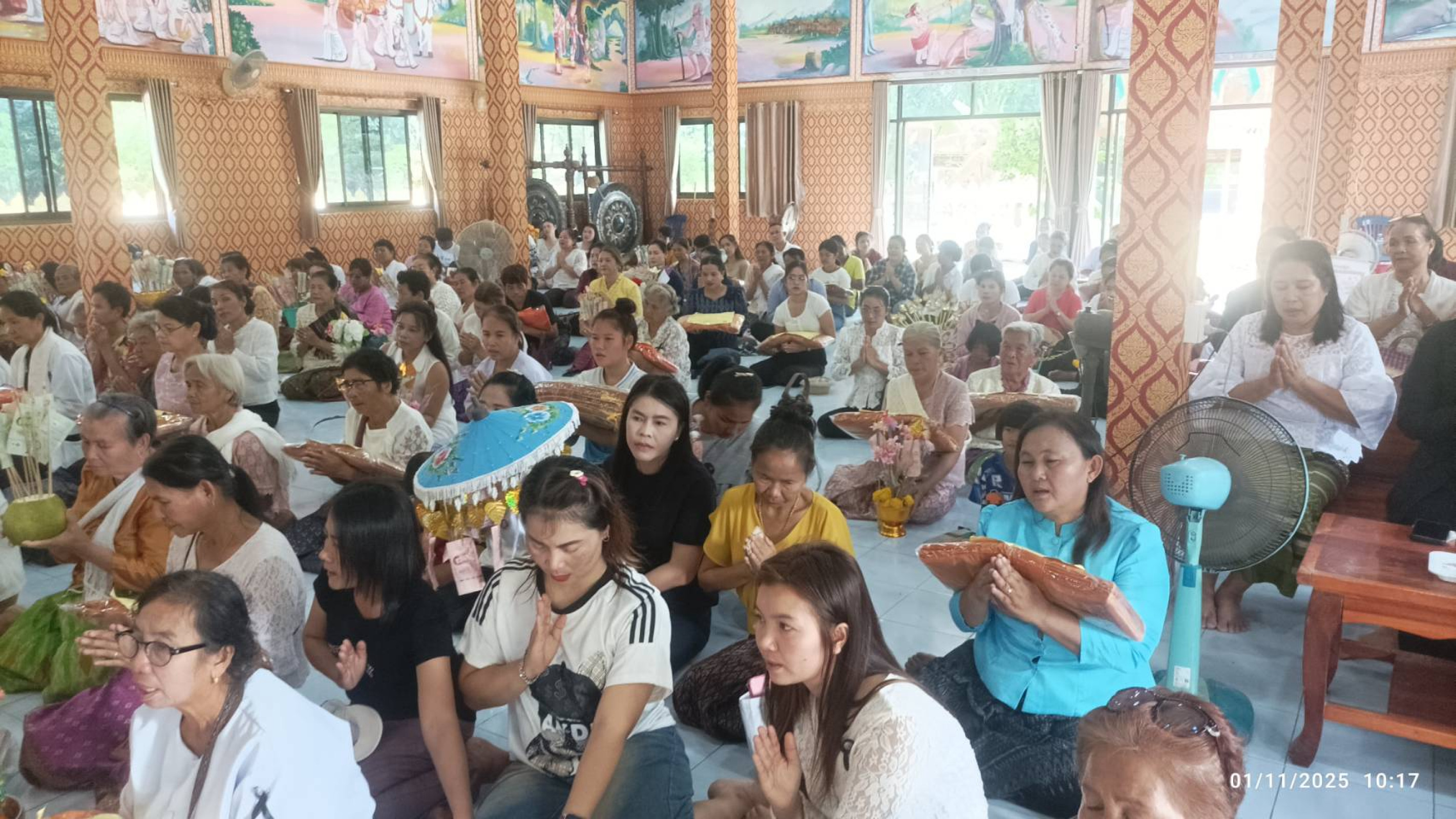 ภาพร่วมพิธีกรรมวัดโพนแอวขัน