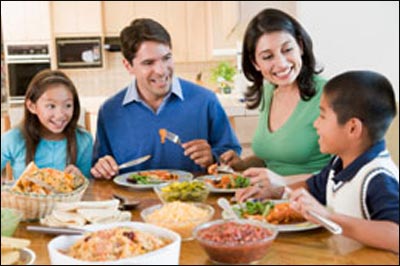 Eating together allows family members to voice their concerns and to give advice to others because people are often in a better mood when they are full. 